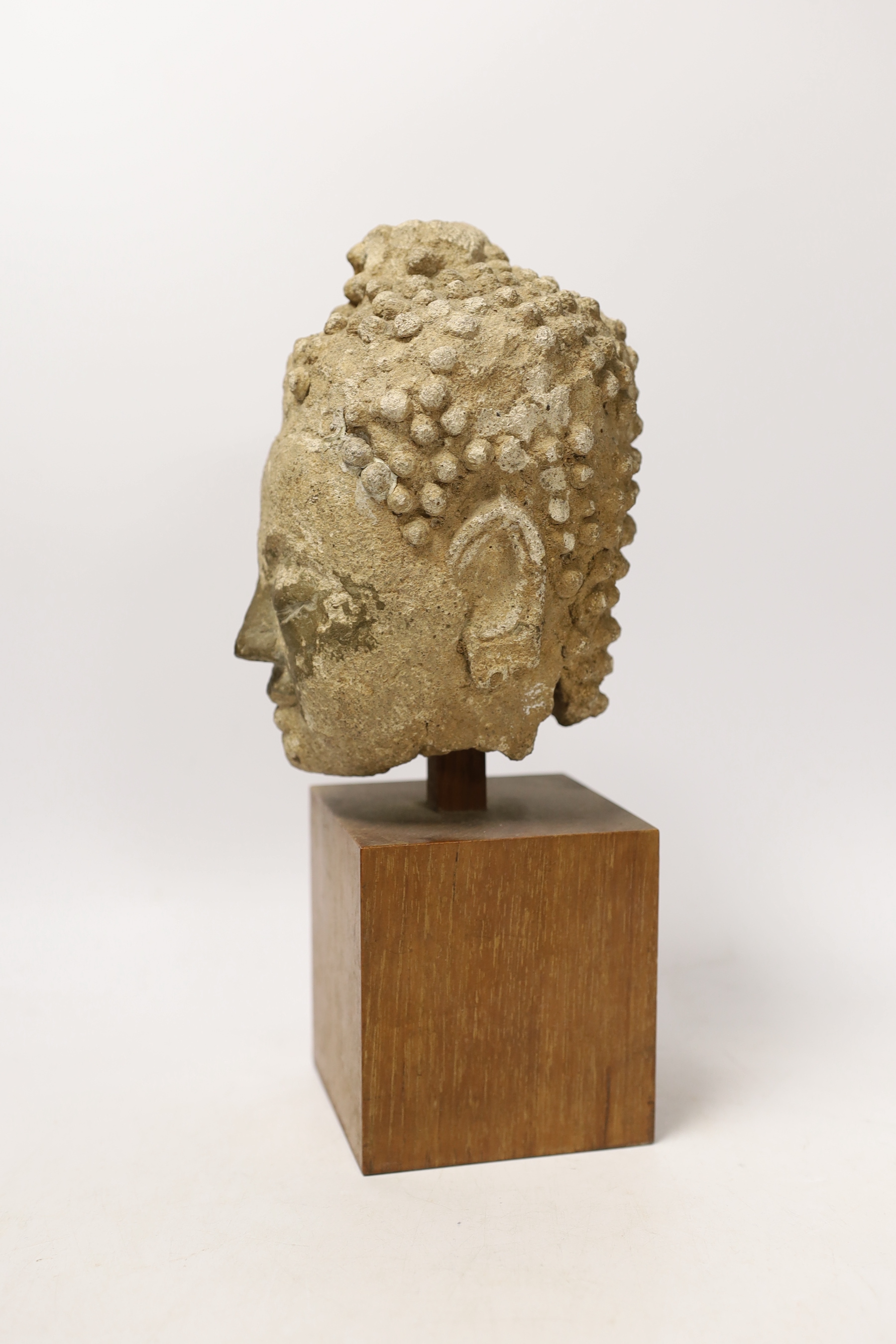 A South East Asian limestone head of Buddha, 29cm